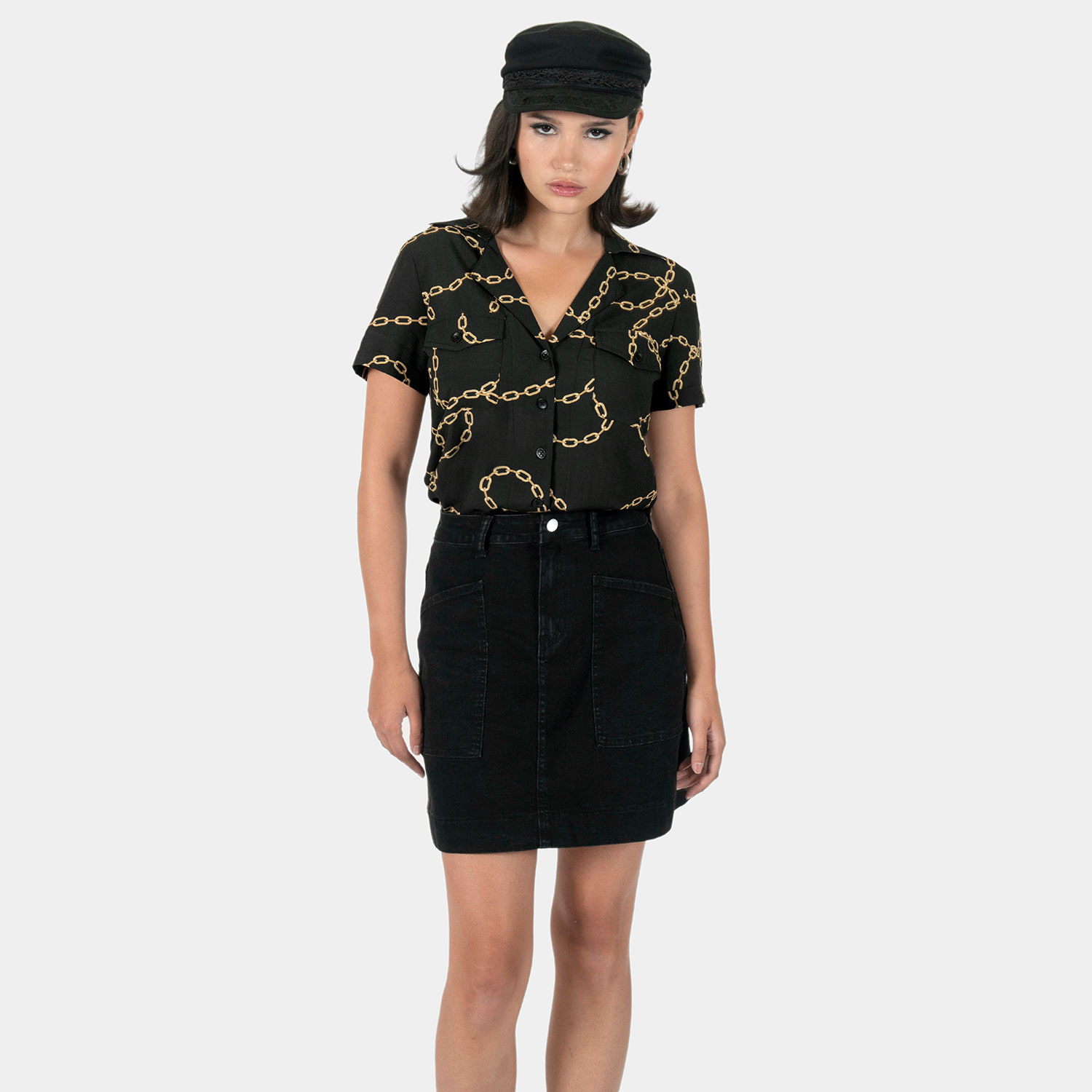 The Chains of Love shirt, filled with our chains artwork. Soft cream fabric meets a deep-V button-up closure, dual chest pockets, and cuffed short sleeves in our Casual fit.