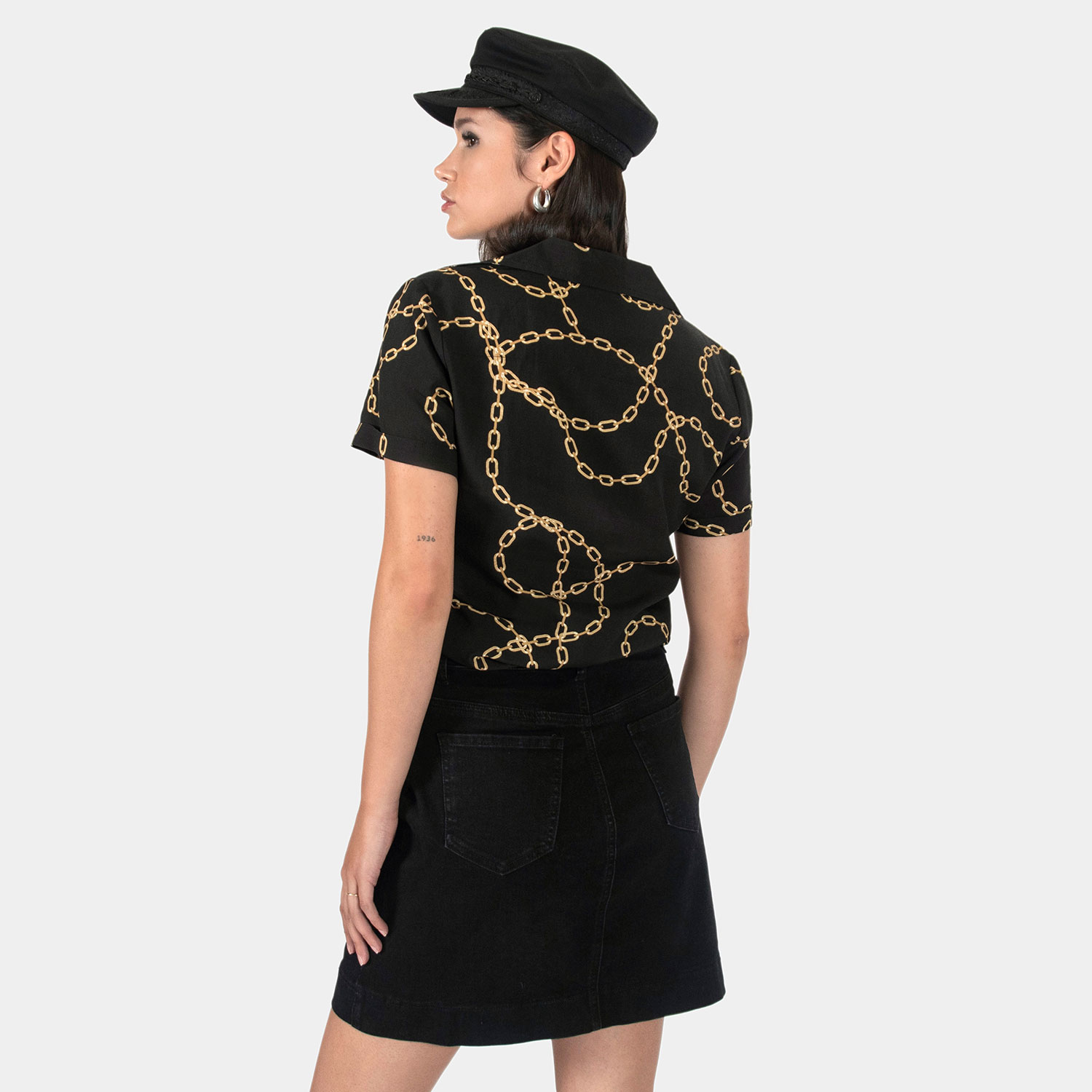 The Chains of Love shirt, filled with our chains artwork. Soft cream fabric meets a deep-V button-up closure, dual chest pockets, and cuffed short sleeves in our Casual fit.