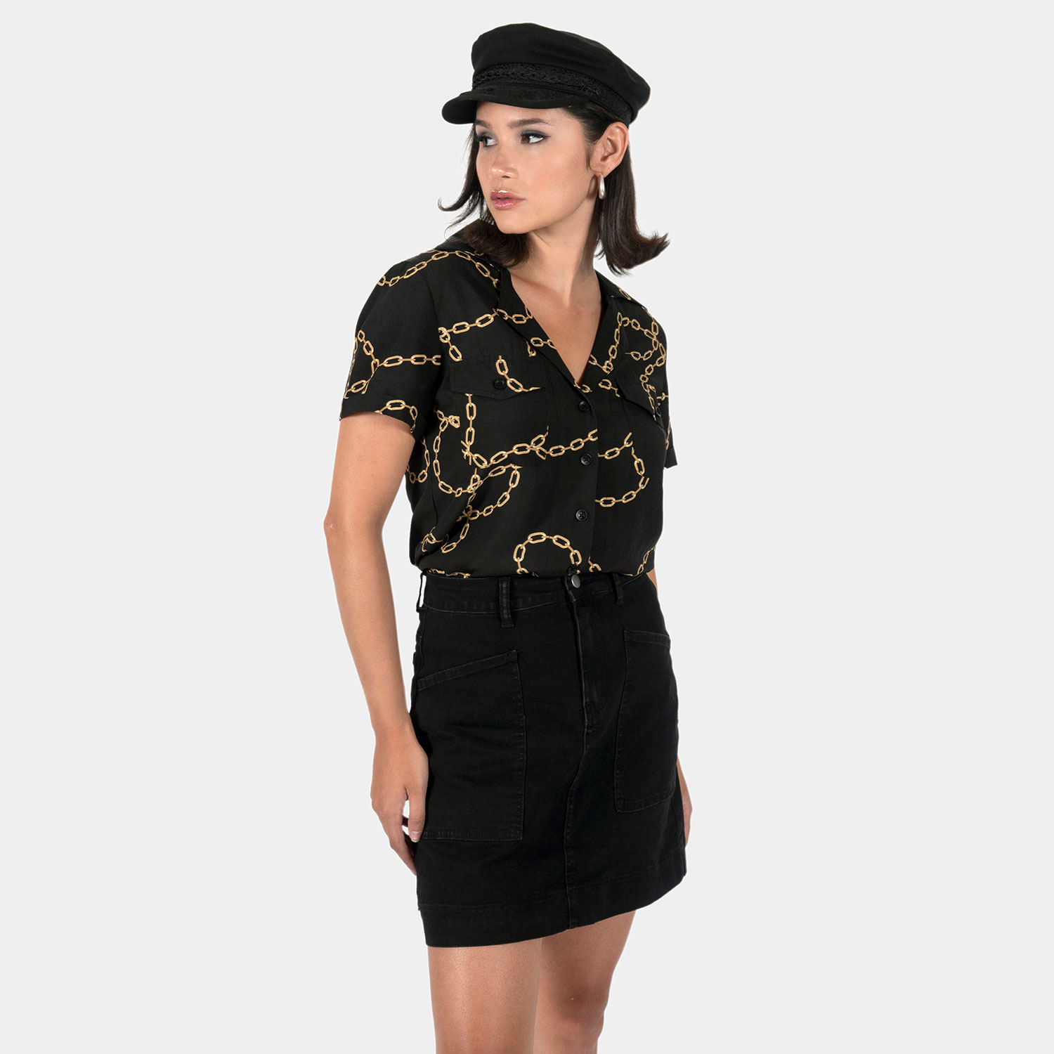The Chains of Love shirt, filled with our chains artwork. Soft cream fabric meets a deep-V button-up closure, dual chest pockets, and cuffed short sleeves in our Casual fit.