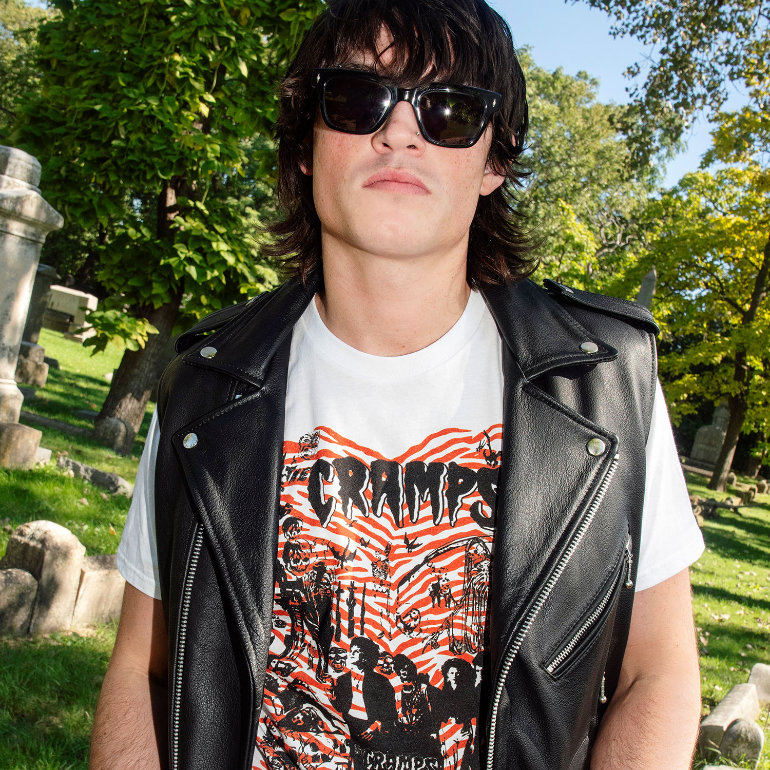 The Cramps official t-shirts are here for a limited time. This collage of Rockin’ Bones graveyard imagery and skeletons is pulled from a mid-’80s promotional t-shirt and reworked with The Cramps’ love for tiger stripes. For the fan who expects more from a band tee, this graphic is anything but background noise. Made from soft cotton and printed in-house in Chicago. This is our Everyday fit. Let’s talk about The Cramps and their shocking sound. Trashy, primitive punk and garage rock collide with raw R&B, fuzzed-out rockabilly gone wrong, B-movie sleaze, and ’50s rock ‘n’ roll dragged through the gutter. Do you get it now? Good.