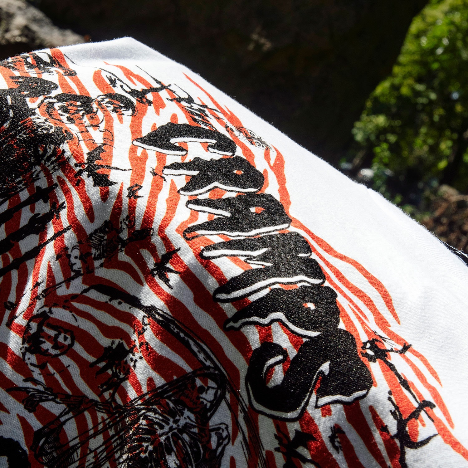 The Cramps official t-shirts are here for a limited time. This collage of Rockin’ Bones graveyard imagery and skeletons is pulled from a mid-’80s promotional t-shirt and reworked with The Cramps’ love for tiger stripes. For the fan who expects more from a band tee, this graphic is anything but background noise. Made from soft cotton and printed in-house in Chicago. This is our Everyday fit. Let’s talk about The Cramps and their shocking sound. Trashy, primitive punk and garage rock collide with raw R&B, fuzzed-out rockabilly gone wrong, B-movie sleaze, and ’50s rock ‘n’ roll dragged through the gutter. Do you get it now? Good.