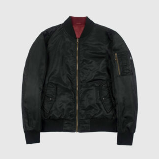Reversible flight jacket, featuring black and burgundy nylon with brass hardware. Two different color styles in one jacket, so you’ve always got another option. Side pockets and classic utility bicep pocket with STH woven label. Durable elastic cuffs, waistband, and neck. This is our Proper fit.