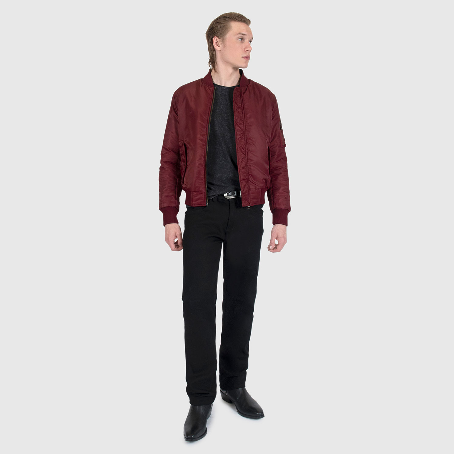 Reversible flight jacket, featuring black and burgundy nylon with brass hardware. Two different color styles in one jacket, so you’ve always got another option. Side pockets and classic utility bicep pocket with STH woven label. Durable elastic cuffs, waistband, and neck. This is our Proper fit.