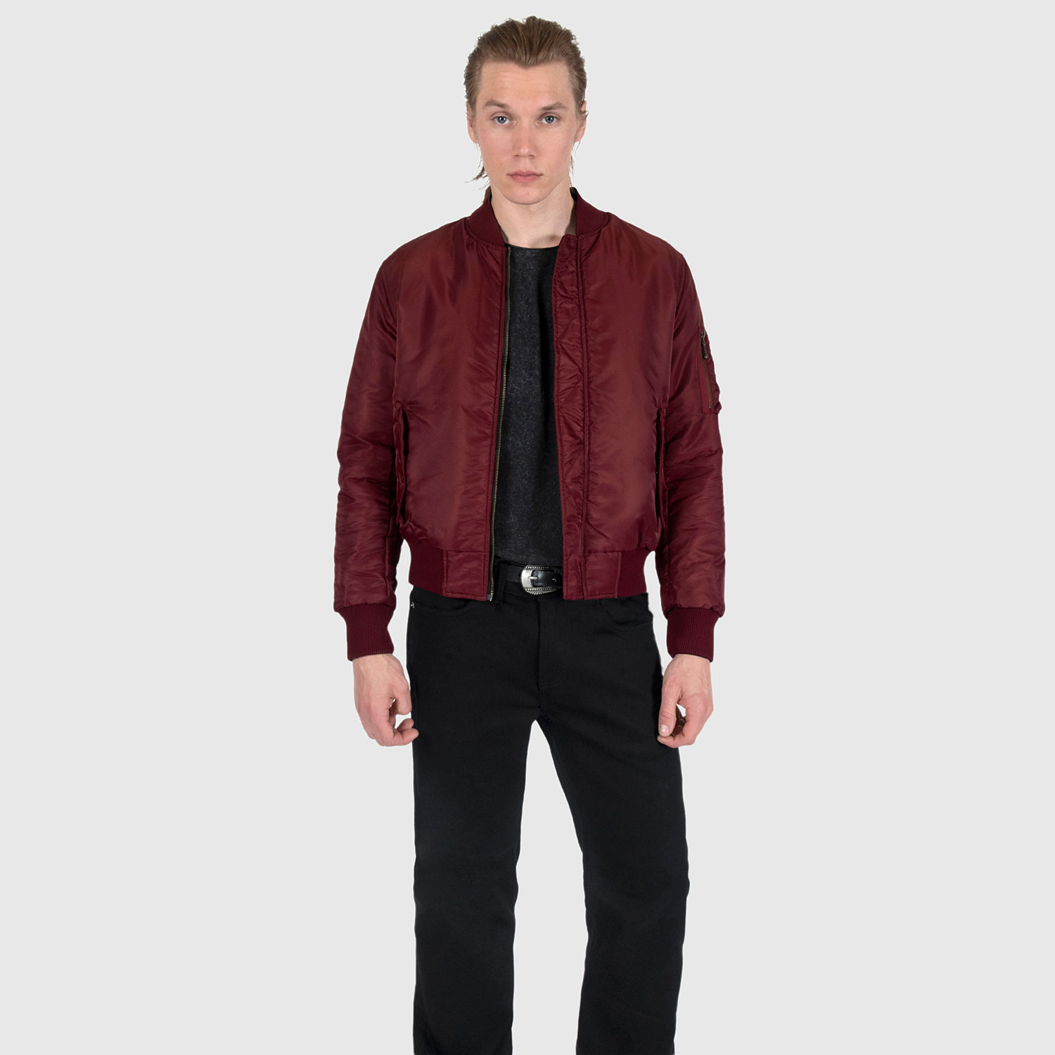 Reversible flight jacket, featuring black and burgundy nylon with brass hardware. Two different color styles in one jacket, so you’ve always got another option. Side pockets and classic utility bicep pocket with STH woven label. Durable elastic cuffs, waistband, and neck. This is our Proper fit.